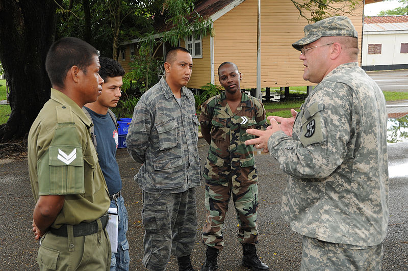 File:U.S. Army Sgt. Trey Carter, right, a nurse, and combat medic, with 94th Combat Support Hospital goes over after-action review points, with combat medics, from Belize Defence Force, Belize Police, and Belize 100830-A-CL600-113.jpg
