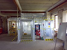 Typical UK temporary enclosure used for asbestos removal UK Asbestos Removal Enclosure.jpg