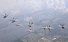 Squadron F/A-18 Hornets over Louisiana in 2009 US Navy 090711-N-9712C-003 Eight FA-18s in formation.jpg