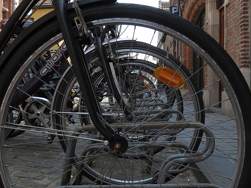 File:View through bicycle wheels in bruges.jpg