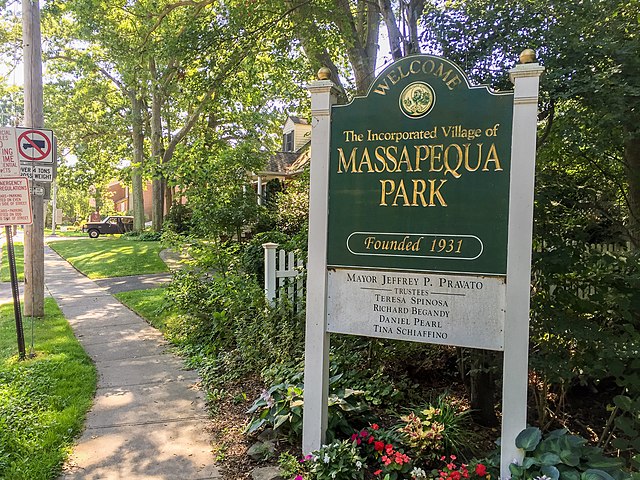 A welcome sign at an entrance to Massapequa Park in 2016