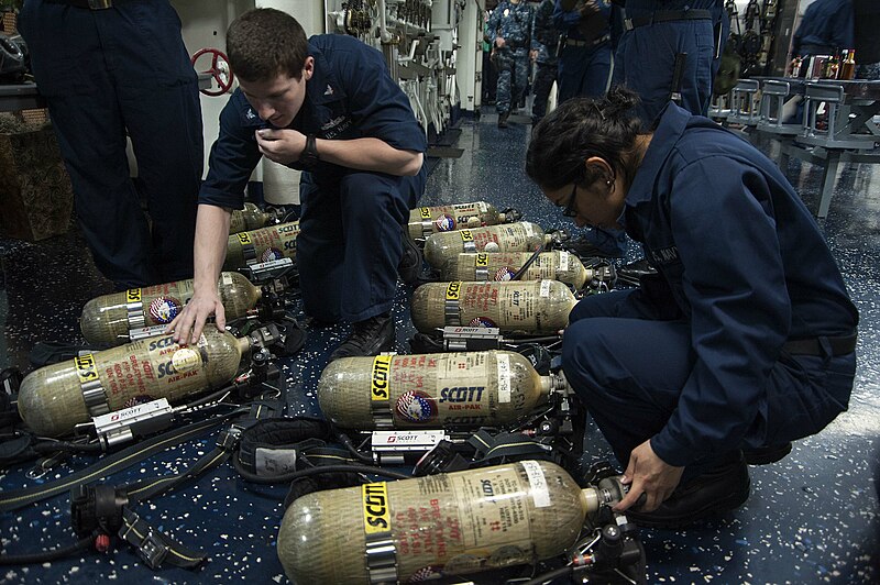 File:140408-N-RY581-025 Angel Lopez conducts SCBA checks.jpg