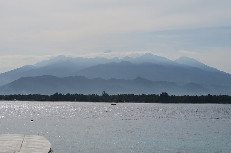 File:20160317084058 - Gunung Rinjani from the ferry terminal at Gili Meno. Clear summit for once (25550662640).jpg