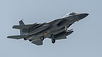 A US Air Force F-15C Eagle, tail number 83-0011, on final approach at Kadena Air Base in Okinawa, Japan. The aircraft is assigned to the 67th Fighter Squadron.