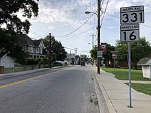 MD 16 and MD 331 running concurrently through central Preston 2022-06-22 08 40 28 View south along Maryland State Route 331 and west along Maryland State Route 16 (Main Street) at Chambers Street in Preston, Caroline County, Maryland.jpg