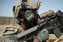 A U.S. Marine with a Marine special operations team assists with security during the construction of an Afghan Local Police (ALP) checkpoint in Helmand province, Afghanistan, March 30, 2013 130330-M-BO337-085.jpg