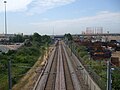 View southwards from Conduit Lane, footpath visible to the right of the tracks.