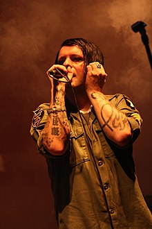 Groth performing with Apoptygma Berzerk in 2014