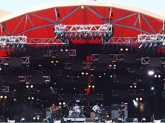Arctic Monkeys performing on Orange stage at Roskilde Festival in 2007 Arctic Monkeys Orange RF07.jpg