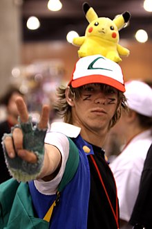 A person wearing Ash's iconic original series attire. Due to its recognizability and good reception, it is a popular cosplay look.