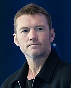 A photograph of Sam Worthington