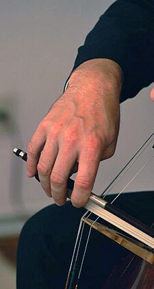 A cello French bow sul ponticello Bow hand Violoncello.jpg