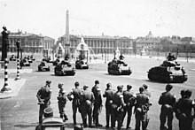 German tank parade in the Place de la Concorde led by SOMUA S 35 tanks, Paris, July 1941. Bundesarchiv Bild 183-1985-1216-530, Paris, Panzer-Parade der deutschen Wehrmacht auf dem Place de la Concorde.jpg