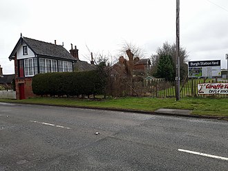 Burgh-le-Marsh station site, signal box and goods yard in 2018 taken from former level crossing Burgh-Le-Marsh station site, signal box and goods yard in 2018 taken from former level crossing.jpg