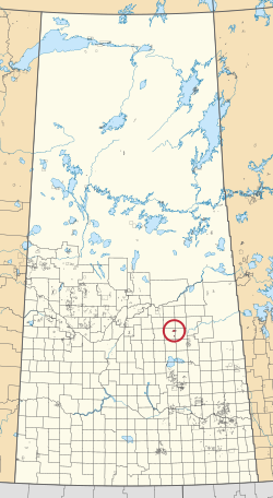 Карта провинции Саскачеван с изображением 297 сельских муниципалитетов и сотен небольших индейских заповедников. Один выделен красным кружком.