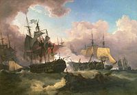 On a stormy sea beneath towering clouds with a central patch of blue sky, at least four sailing warships can be seen within a bank of thick smoke. In the centre a large and lightly damaged ship lies next to a dismasted hulk while in the foreground floats wreckage with men clinging to it.