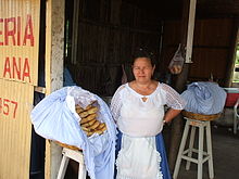 A woman shopkeeper in Paraguay. Chipa piru Paraguay.jpg