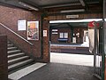 Entrance to platform 1 and the stairs to footbridge