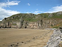 The cliffs on the south side showing fractures in the limestone.