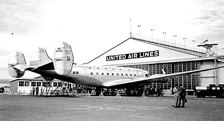 The giant new DC-4E at the United Air Lines base at Oakland Airport