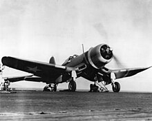 An F4U-1 Corsair from VMF-213, warming up on the flight deck of the escort carrier USS Copahee (CVE-12), on 29 March 1943.