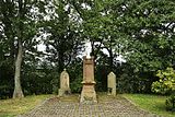 Cemetery cross and tombs