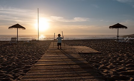 Gabriel at Porto Novo beach at sunset, Portugal