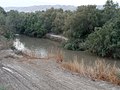 The State of Israel's Eastern border with the Kingdom of Jordan, in the Jordan Rift Valley area, passes through the Jordan River. A pole embedded in the river bed marks the point of the physical border between the two countries