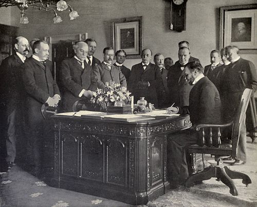 John Hay, Secretary of State, signing the memorandum of ratification on behalf of the United States
