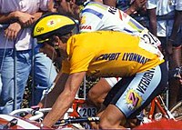 Greg LeMond in the final stage of the 1990 Tour de France, wearing the yellow jersey despite not winning any stage in that year. Lemond.jpg