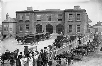 The station in 1907. Limerick Railway Station Fast Excursion to the International Exhibition.jpg