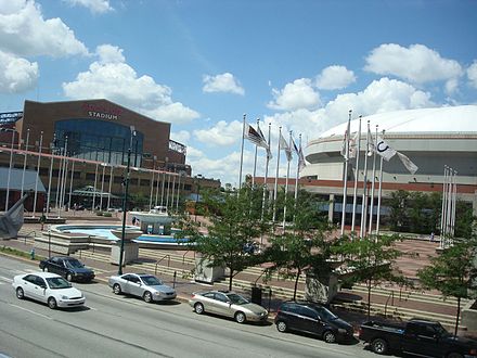 Lucas Oil Stadium (left) replaced the RCA Dome (right) in 2008.