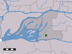 Das Dorfzentrum (dunkelgrün) und das statistische Viertel (hellgrün) von Hank in der ehemaligen Gemeinde Werkendam.