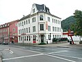 Apartment building in half-open development