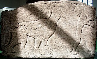 One end of Meigle 26, depicting a man and a manticore. Meigle 26 end.jpg