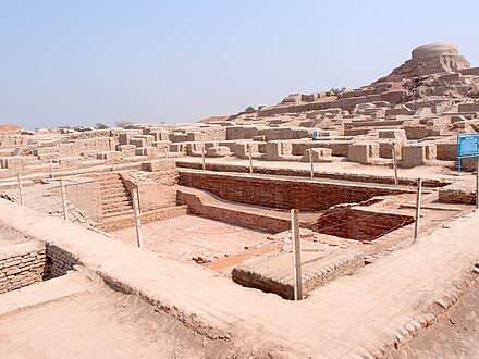 Excavated ruins of Mohenjo-daro, Sindh province, Pakistan, showing the Great Bath in the foreground. Mohenjo-daro, on the right bank of the Indus River, is a UNESCO World Heritage Site, the first site in South Asia to be so declared.