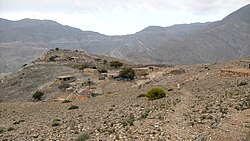 Musaibat with the Jabal ar Rahrah Ridge in the background