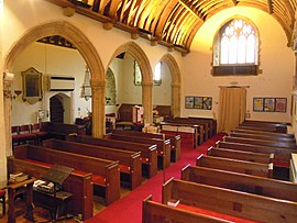 A view down the nave of St Peter's church Nave St Peters church Shirwell.jpg