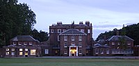The north side of Bushy House, Teddington, in 2007. Its residents included Queen Adelaide, widow of William IV, and Prince Louis, Duke of Nemours Npl bushy house 2.JPG