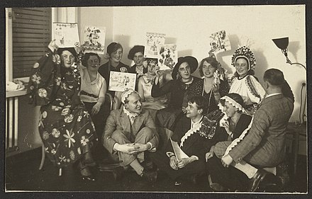Party at Otti Berger's. Berger, back row far right, with headdress. Digital image courtesy of the Getty's Open Content Program.