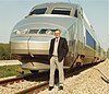 Paul Wild of CSIRO standing in front of a TGV in France in 1989