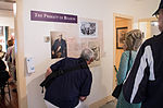 Visitors to the Robert Green Ingersoll Birthplace Museum study the new wall graphics, part of the T. M. Scruggs Museum Interior installed for the 2014 season. Photo by Monica Harmsen.