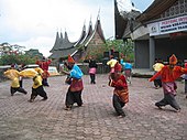 Randai is a folk theater tradition of the Minangkabau ethnic group which incorporates music, singing, dance, drama and the silat martial art. Randai is usually performed for traditional ceremonies and festivals, and complex stories may span a number of nights. Randai Padang Panjang.jpg