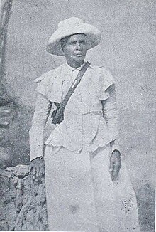 Photograph of Rosa Castellanos in her white military nurse's uniform