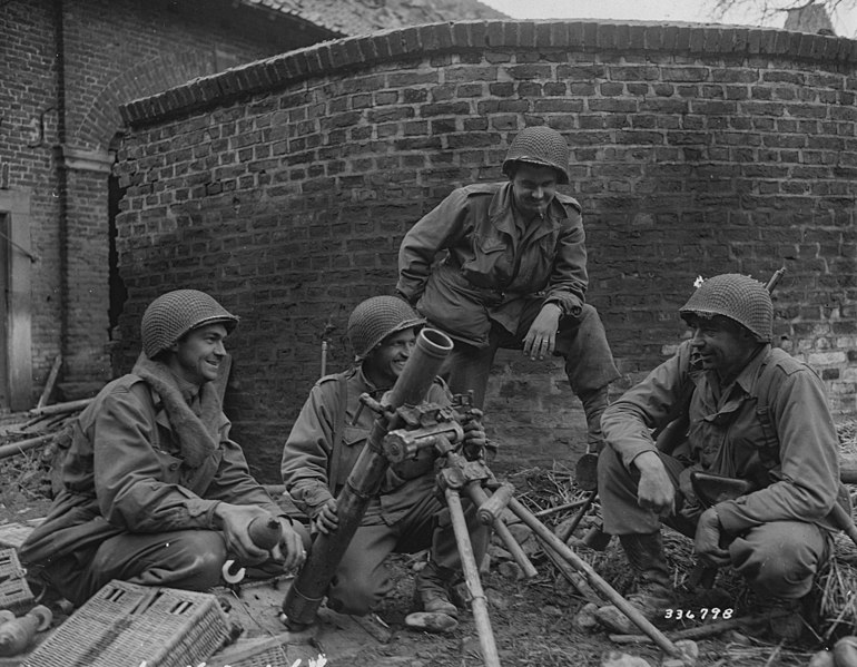 File:SC 336798 - Four infantrymen of Company F, 413th Regiment, 104th Division, First U.S. Army, pose with a captured German 81mm mortar that they used to knock out a German 85mm gun near Duren, Germany. (52201796747).jpg