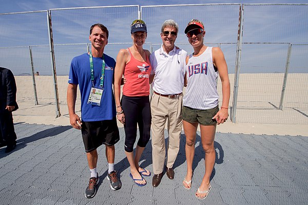 Walsh with April Ross and John Kerry