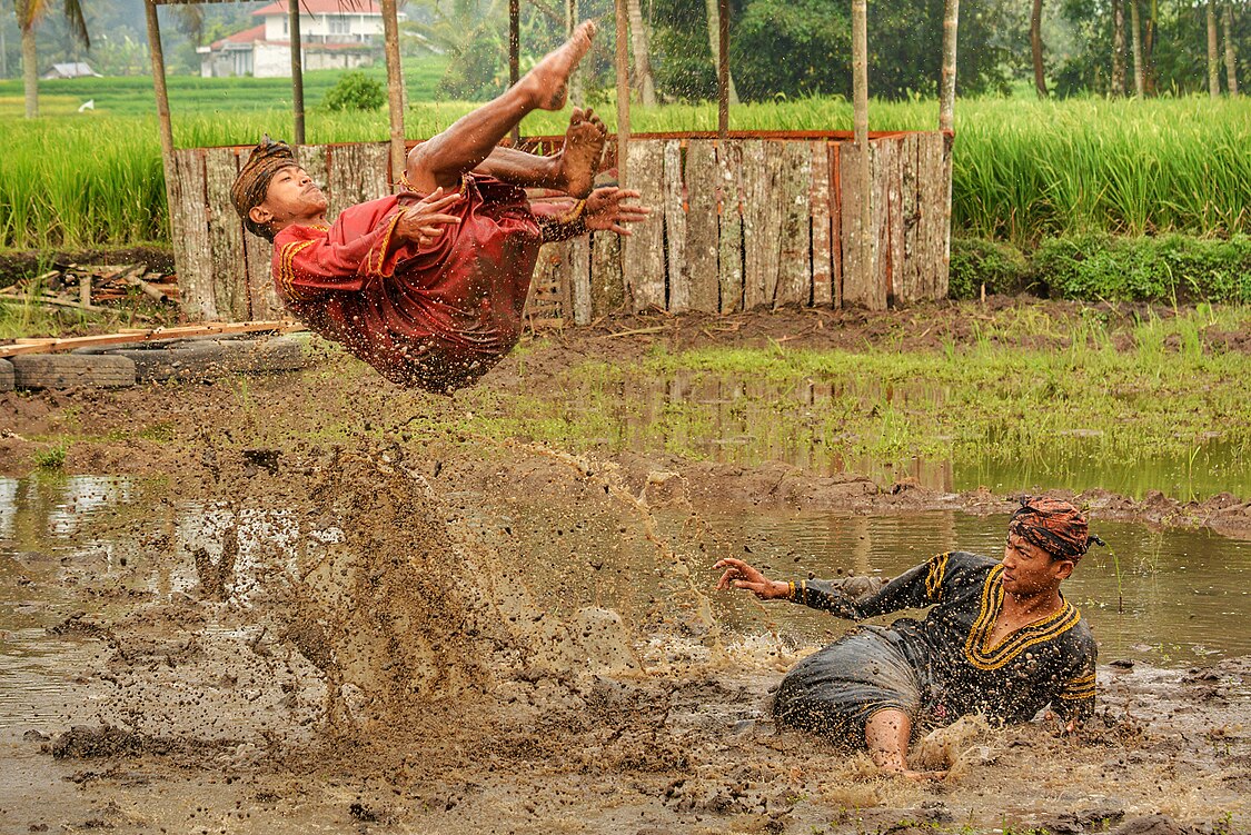 :File:Silek Lanyah 2020 - Two men performing martial art in a stream.jpg