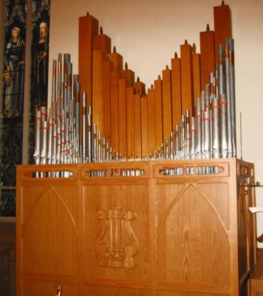 The choir division of the organ at St. Raphael's Cathedral, Dubuque, Iowa. Wood and metal pipes of a variety of sizes are shown in this photograph.