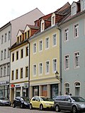 Residential house in closed development, with side wing to the courtyard and rear building