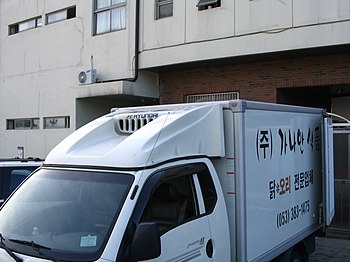 A truck with added bodywork on top of the cab to reduce drag.